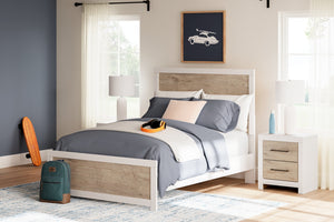 Charbitt Panel Bed
