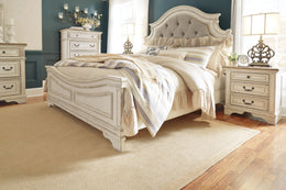Realyn Upholstered Panel Bed
