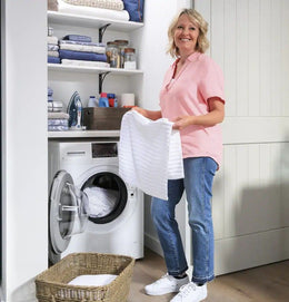 GE - 2.4 Cu. Ft. High-Efficiency Front Load Washer and Electric Condenser Dryer Combo with Steam and Sanitize - White